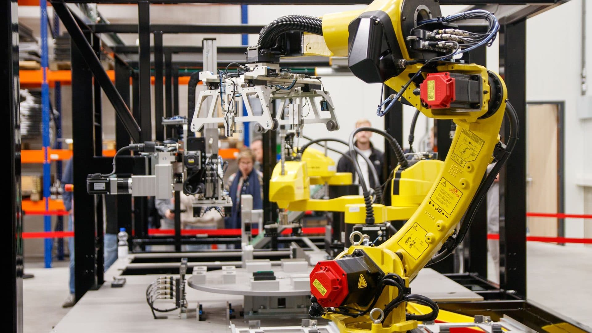 Robotic arm working on an automated production cell